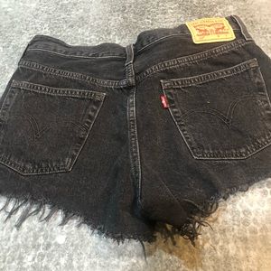 Levi’s black button fly. size 28
